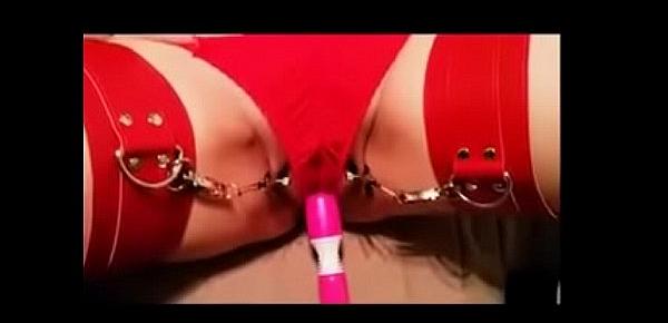  Woman wearing red panties is stimulating the clitoris